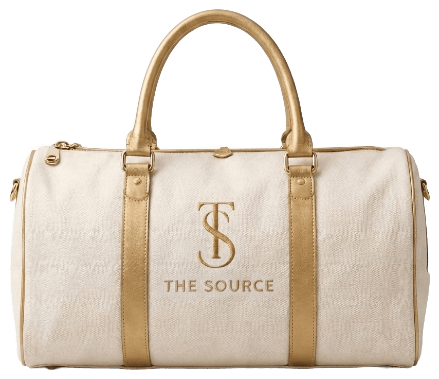 The Source canvas duffel in cream with gold hardware